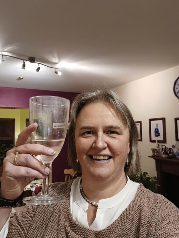 Image of me holding a glass with Prosecco